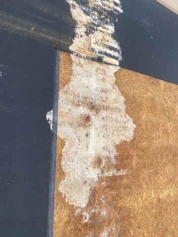 Metal Roof leaked and decking was not protected.